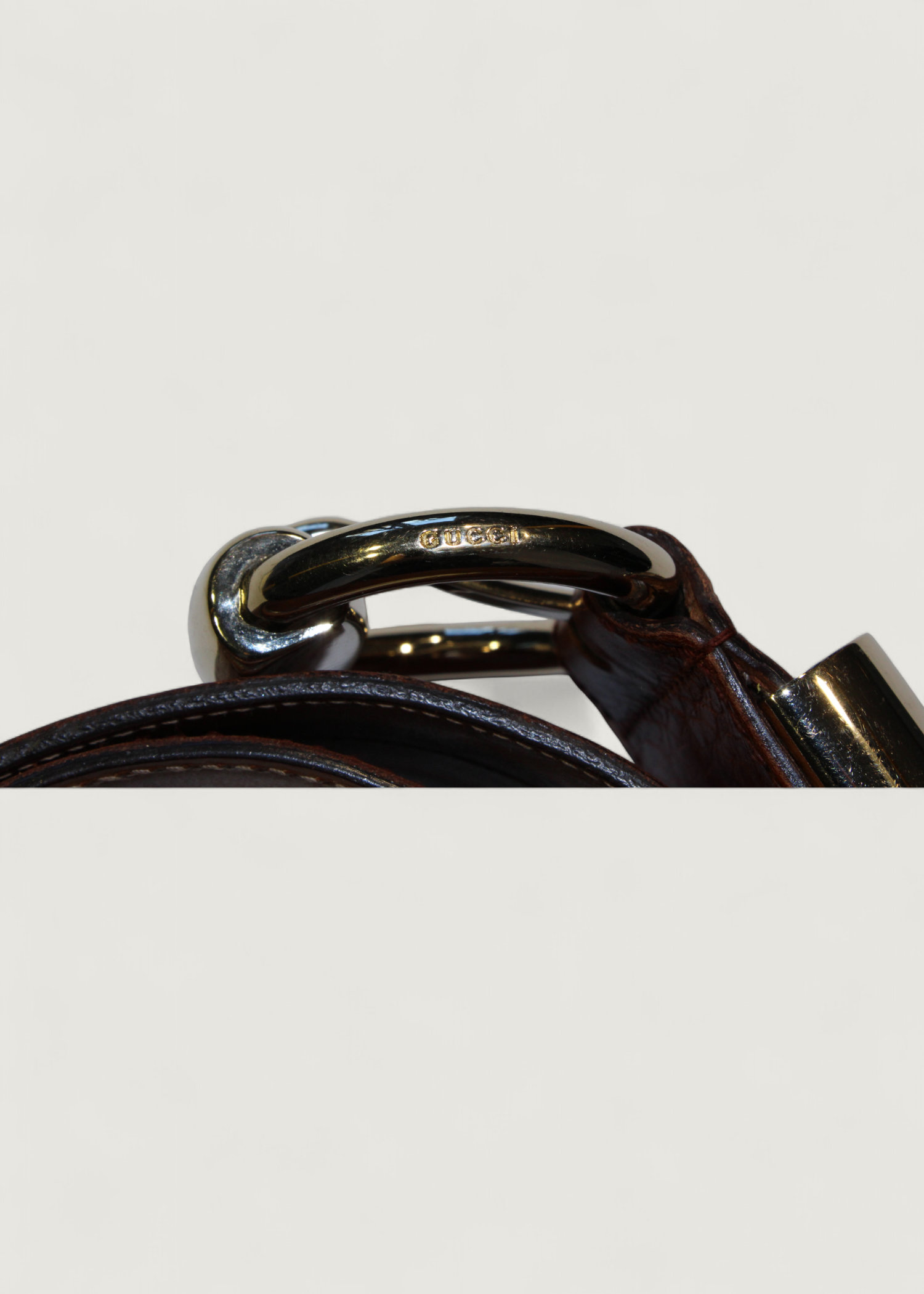 Preloved | Gucci Monogram Guccissima Bredt Læderbælte i Brunt med Guldspænde
