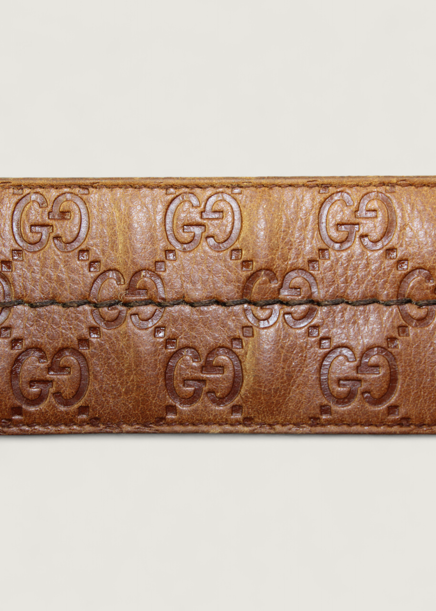 Preloved | Gucci Monogram Guccissima Bredt Læderbælte i Brunt med Guldspænde