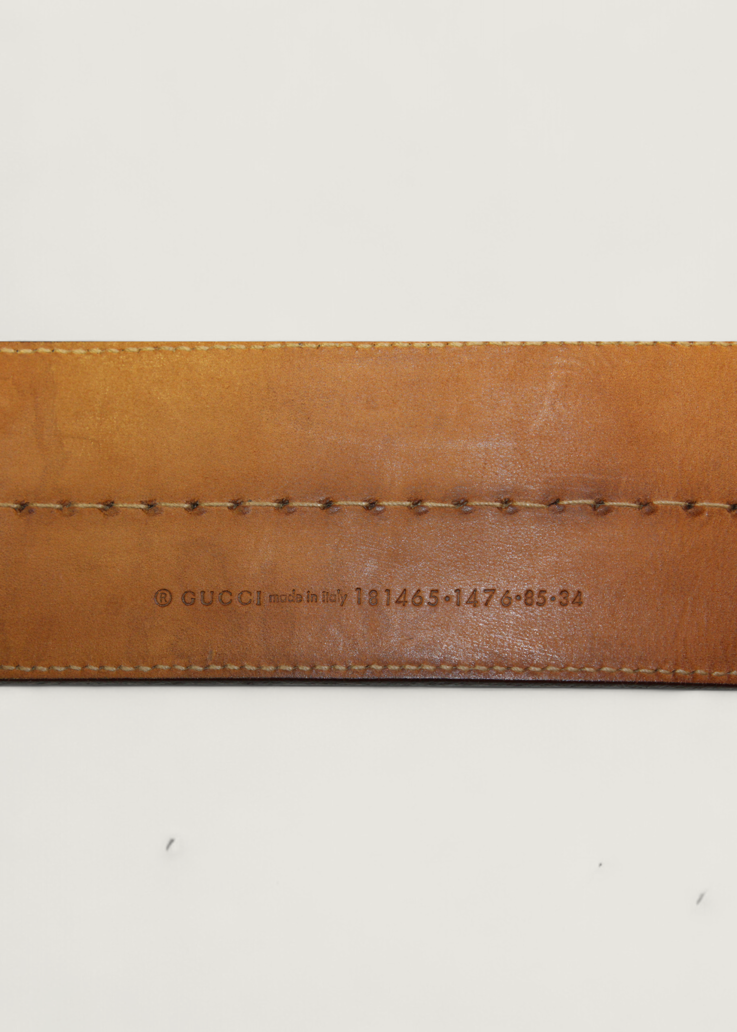 Preloved | Gucci Monogram Guccissima Bredt Læderbælte i Brunt med Guldspænde
