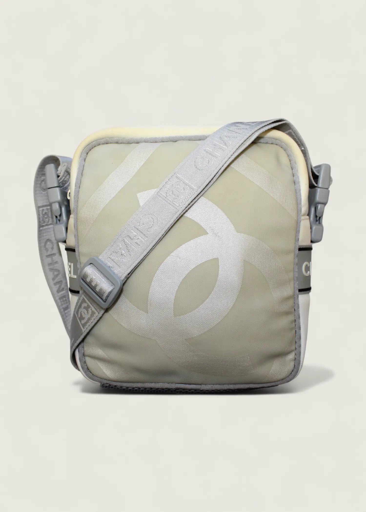 Preloved | Chanel Sport Line Coco Mark CC Crossbody i Beige Nylon Chanel