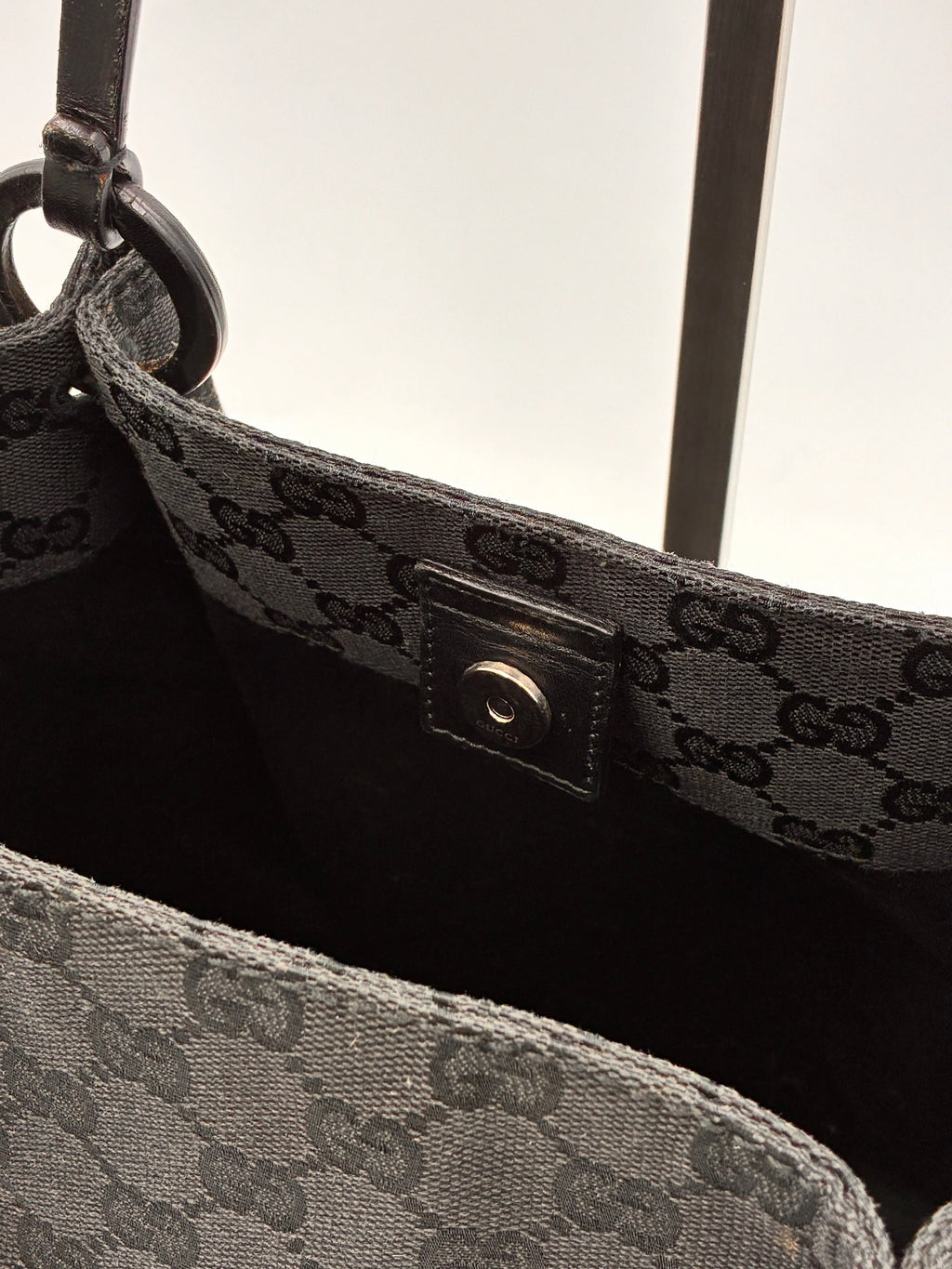 Preloved | Gucci Monogram Håndtaskte i Sort Canvas Gucci