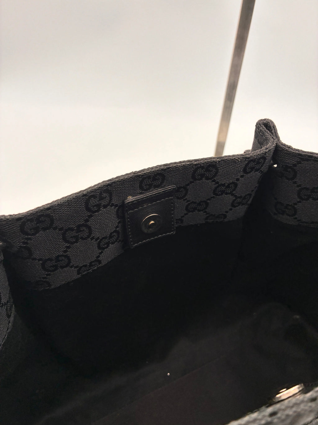 Preloved | Gucci Monogram Håndtaskte i Sort Canvas Gucci