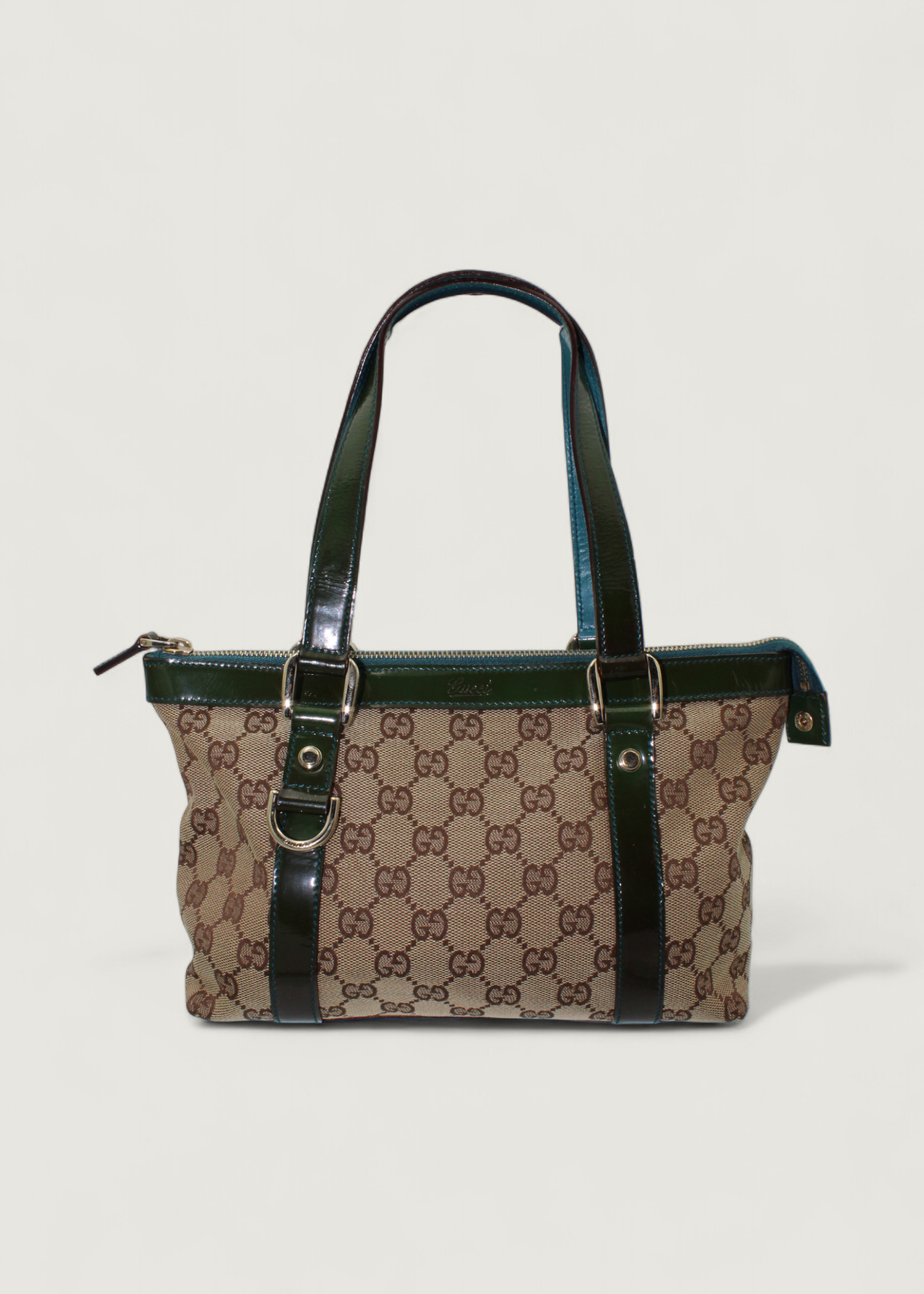 Preloved | Gucci Monogram Abbey Håndtaske i GG Canvas med Grøn Laklæder