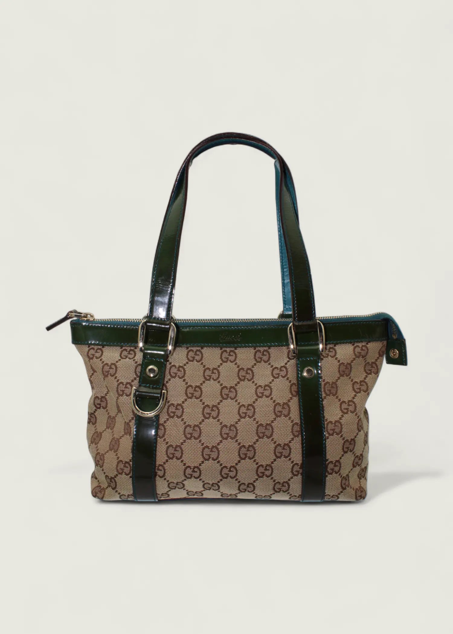 Preloved | Gucci Monogram Abbey Håndtaske i GG Canvas med Grøn Laklæder Gucci