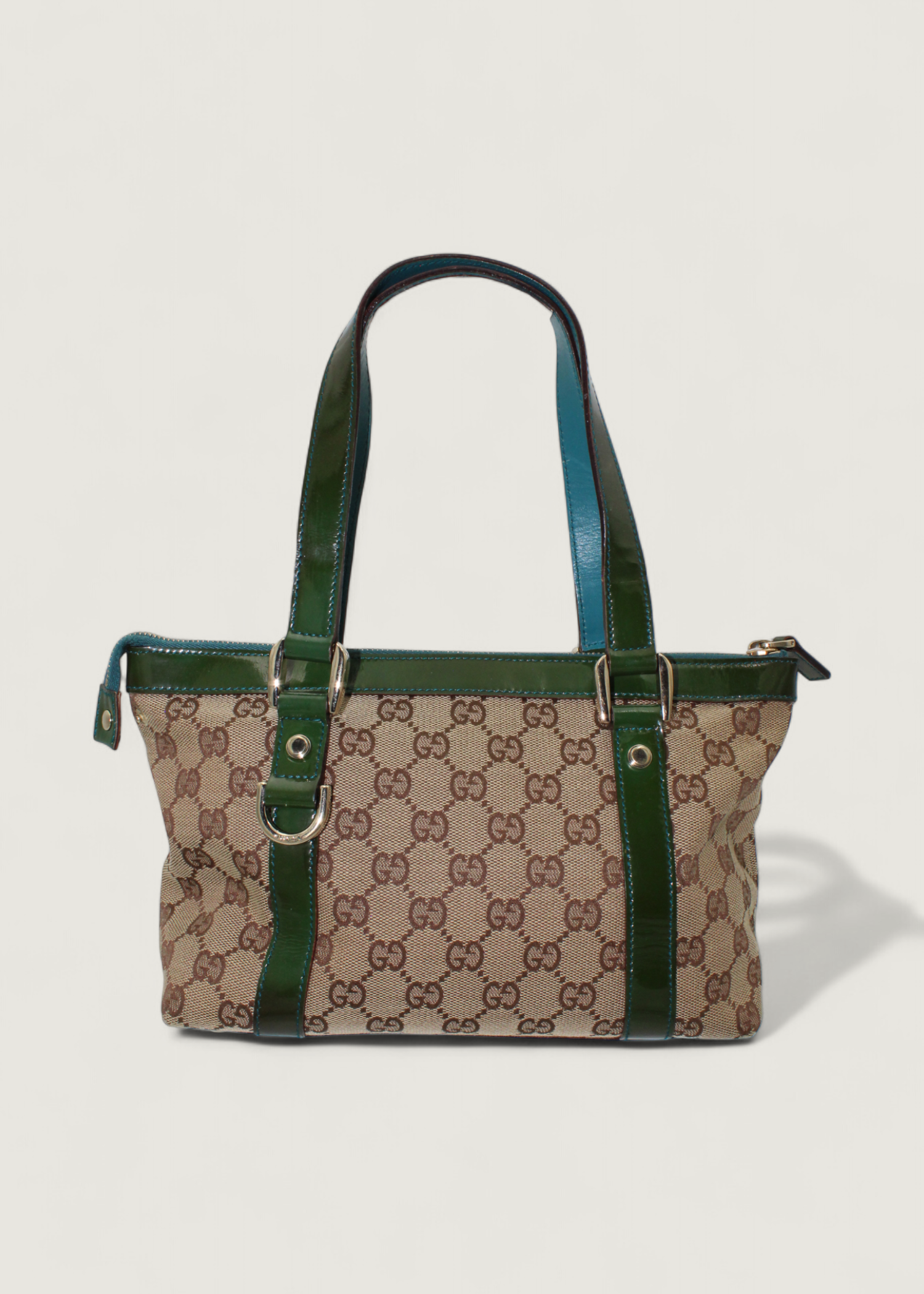 Preloved | Gucci Monogram Abbey Håndtaske i GG Canvas med Grøn Laklæder