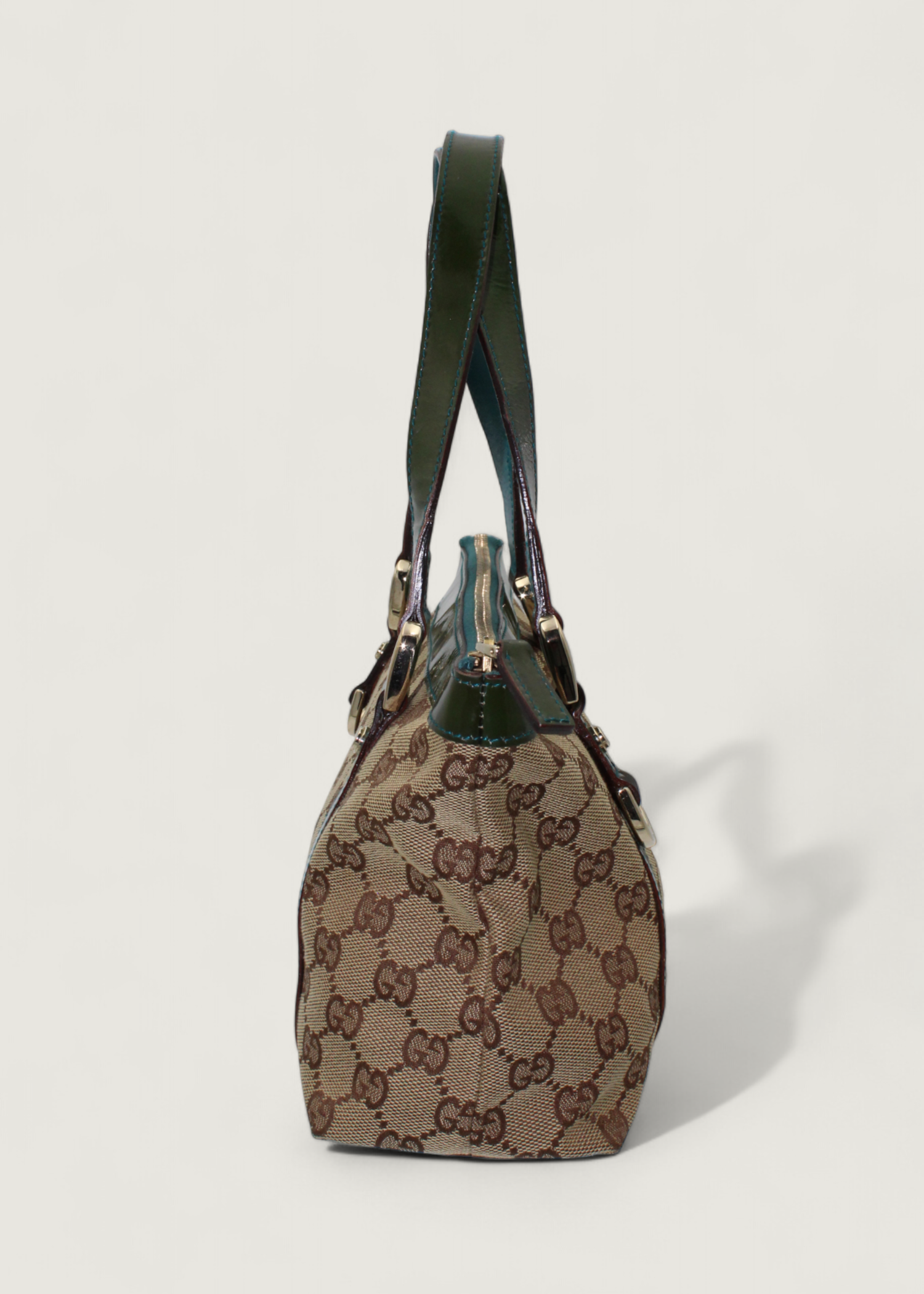 Preloved | Gucci Monogram Abbey Håndtaske i GG Canvas med Grøn Laklæder