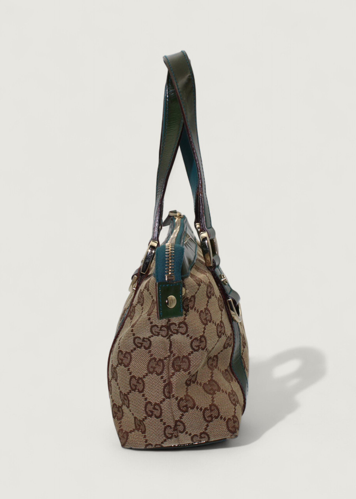 Preloved | Gucci Monogram Abbey Håndtaske i GG Canvas med Grøn Laklæder